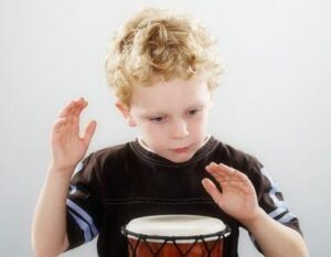 image-music-therapy-child-beating-drum