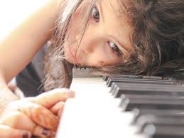 music-therapy-girl-at-piano.