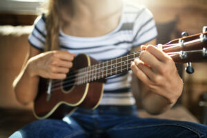 music-therapy-teen-with-ukulele