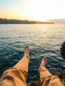 man's-feet-by-water-hopeful